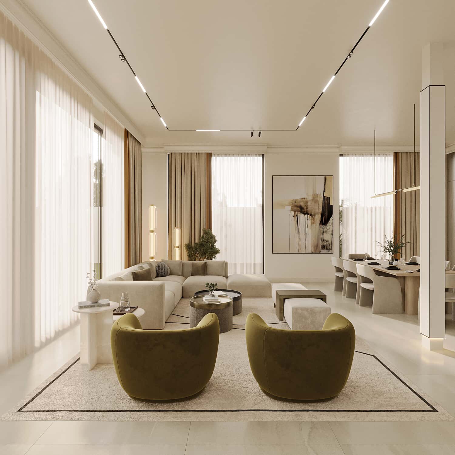 a room with a large couch and chairs
