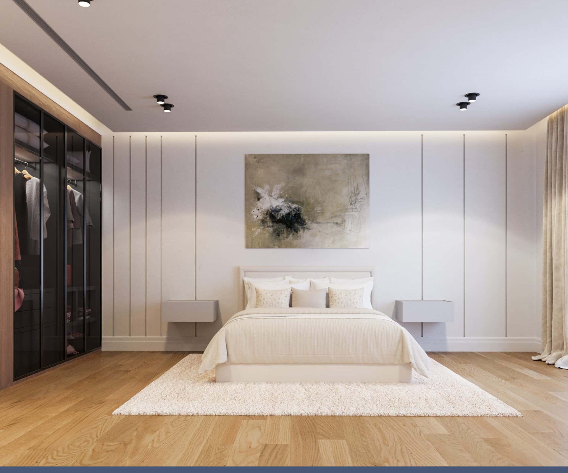 a bedroom with a white bed and a white rug